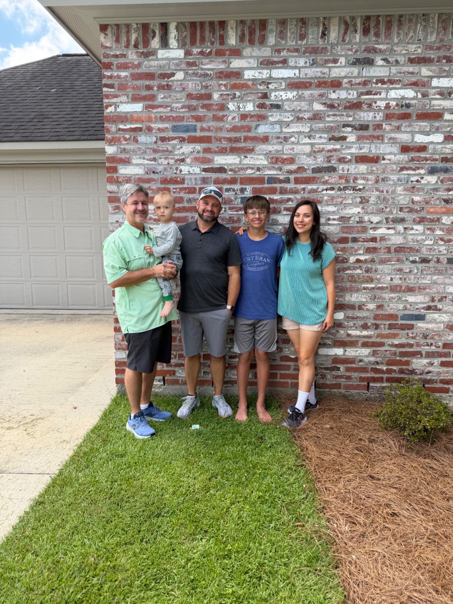 Greg Hinton with Nicholas LeBlanc and his family in Central, Louisiana